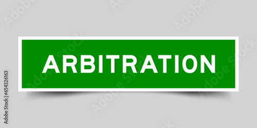 Sticker label with word arbitration in green color on gray background