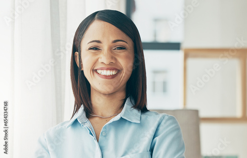 Portrait, smile and business woman in office, startup company and workplace for creative career. Face, happy professional entrepreneur and confident designer, female employee and worker in Brazil