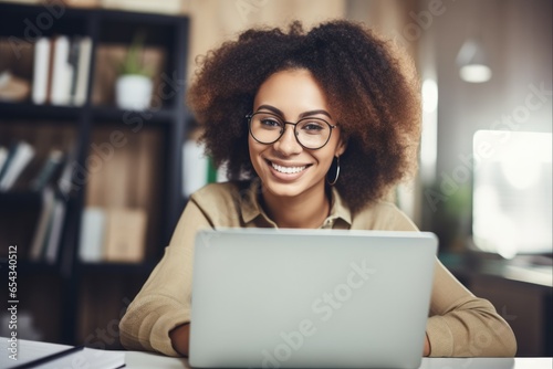 Happy African American Student Attending Online Lecture with Multiracial Group on Screen during Distant Learning and Virtual Communication