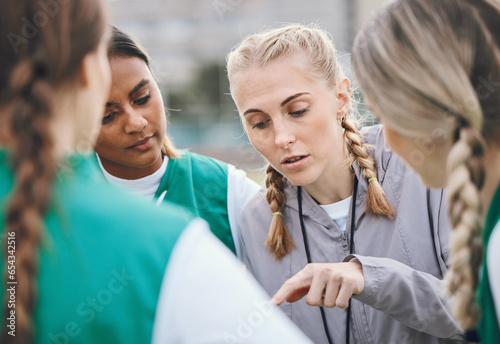 Leader, sports coach or team planning tactics or strategy in a hockey training game, conversation or match. Women, talking or athletes in practice for fitness exercise together for teamwork in group photo