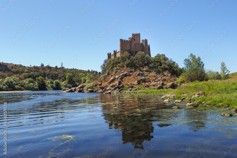 Remains of a Medieval castle of Almourol or Castelo de Almourol on a hill next to Tagus river in the Praia do Ribatejo, Portugal, Santarém district. 