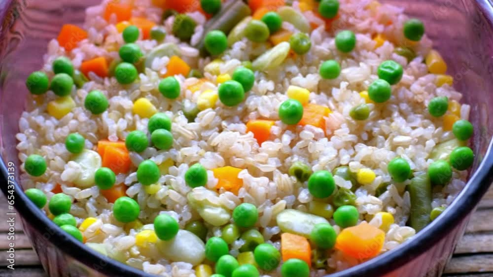 Cooked Brown Rice with Beans and Vegetables in 4K Video Cooked Brown Rice with Beans and Vegetables in 4K Video