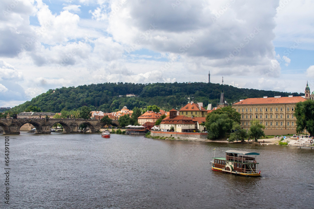 Obraz premium View at Vltava river and Charles Bridge in summer. Prague, Czech Republic. 