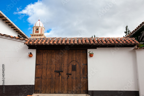 Fototapeta Naklejka Na Ścianę i Meble -  Detail of the beautiful colonial architecture of the streets of the colonial small town of Iza located in the Boyaca department in Colombia