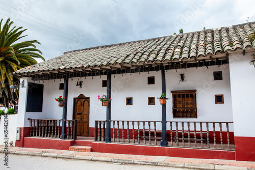 Fototapeta Naklejka Na Ścianę i Meble -  Detail of the beautiful colonial architecture of the streets of the colonial small town of Iza located in the Boyaca department in Colombia