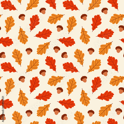 Seamless background with acorns and oak leaves. Red and orange leaves on a beige background. Botanical autumn print. Vector illustration.