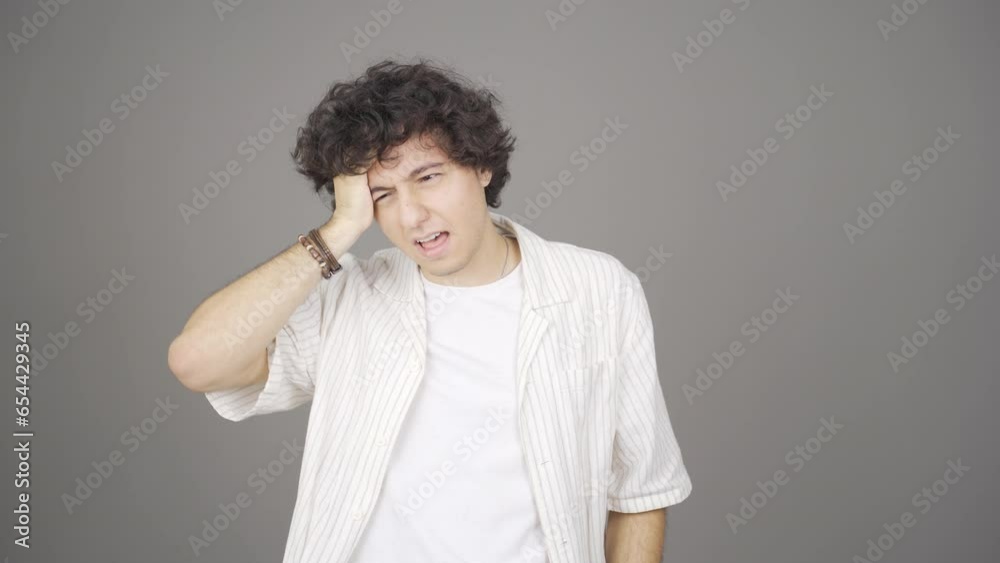 Young man with headache. Young man with headache.