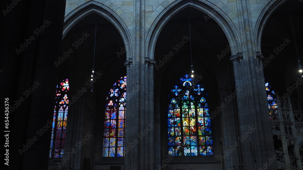 A colorful stained glass window at the cathedral of saint vitus, prague, czech republic