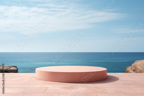 Abstract minimalist podium stage with round pedestals for product presentation against blue sky background and seas