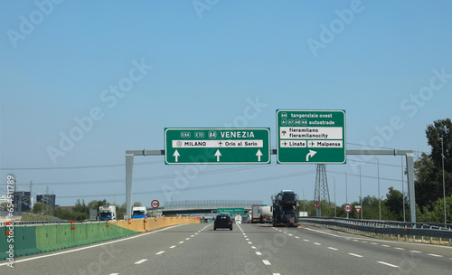 motorway junction with directions to the Italian cities and road junctions photo