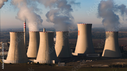 aerial view of coal fired power station and Combined cycle power plant at sunrise, Pocerady, Czech republic photo
