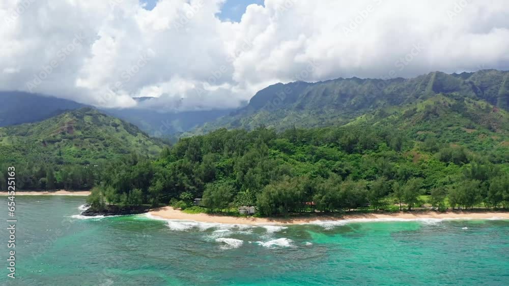 Kauai Homes on Ocean Front with Beautiful Clouds Sunny Day Kauai Homes on Ocean Front with Beautiful Clouds Sunny Day