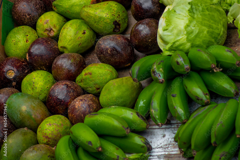 Fruits stacked in the market for sale Fruits stacked in the market for sale