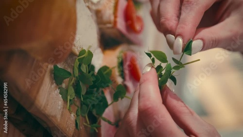 Vertical video, close up of greens placed on a platter or added. High quality 4k footage