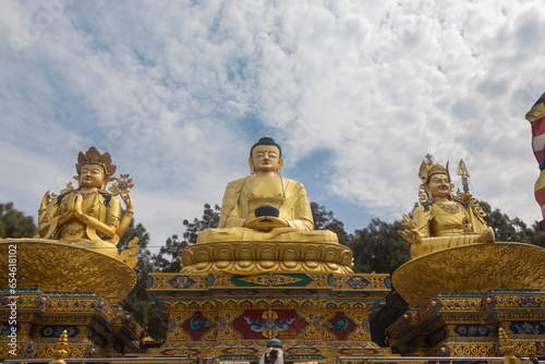 The Golden Buddha Statues in Buddha park, Swayambhunath area, Kathmandu, Nepal, the World Heritage Site declared by UNESCO
