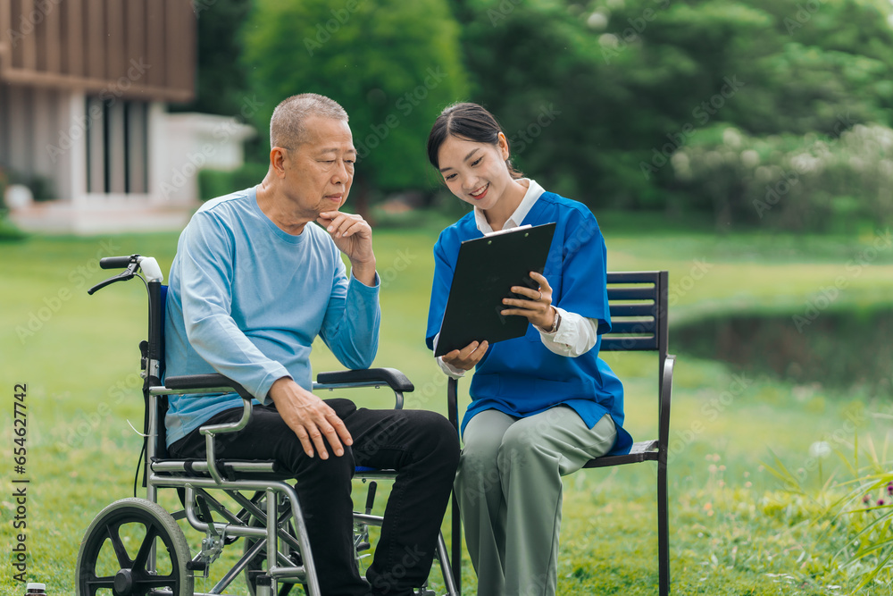 Asian people elderly man on wheelchair with caregiver nurse outdoor, , exemplifying the essence of holistic well-being and compassionate support. Nature Therapy Asian people elderly man on wheelchair with caregiver nurse outdoor, , exemplifying the essence of holistic well-being and compassionate support. Nature Therapy