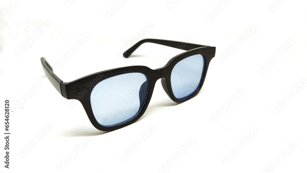 blue lensed sun glasses on a white background blue lensed sun glasses on a white background