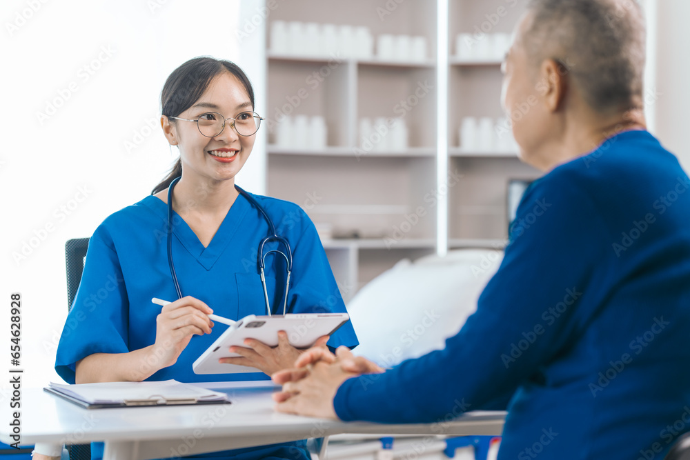 Asian people experienced female doctor giving advice to elderly male patient cancer and x-ray results and treatment options, Cancer Consultation, Elderly Man Receives Expert Cancer Advice Awareness Asian people experienced female doctor giving advice to elderly male patient cancer and x-ray results and treatment options, Cancer Consultation, Elderly Man Receives Expert Cancer Advice Awareness