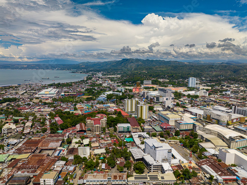 Fototapeta Naklejka Na Ścianę i Meble -  Beautiful city and blue sky and clouds in Cagayan de Oro. Northern Mindanao, Philippines. Cityscape.