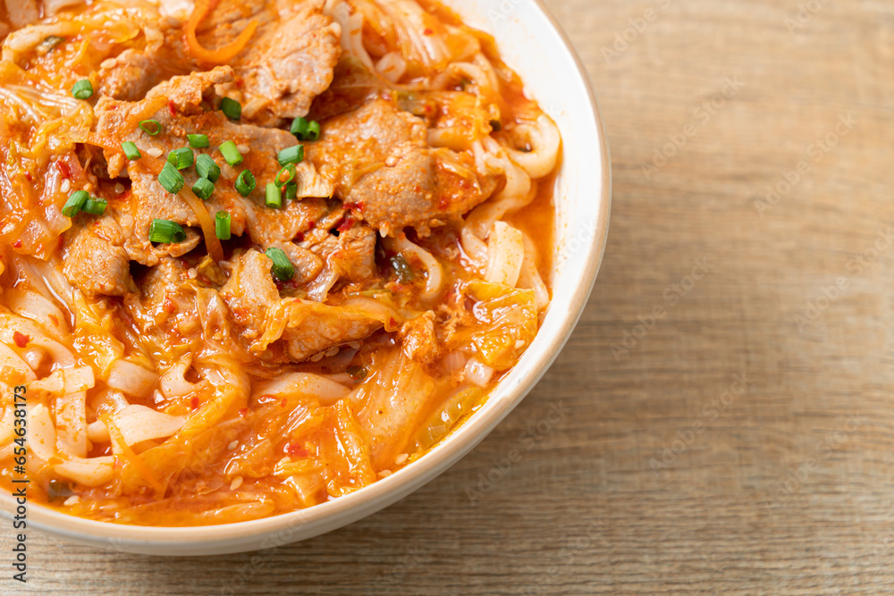 Korean udon ramen noodles with pork in kimchi soup Korean udon ramen noodles with pork in kimchi soup