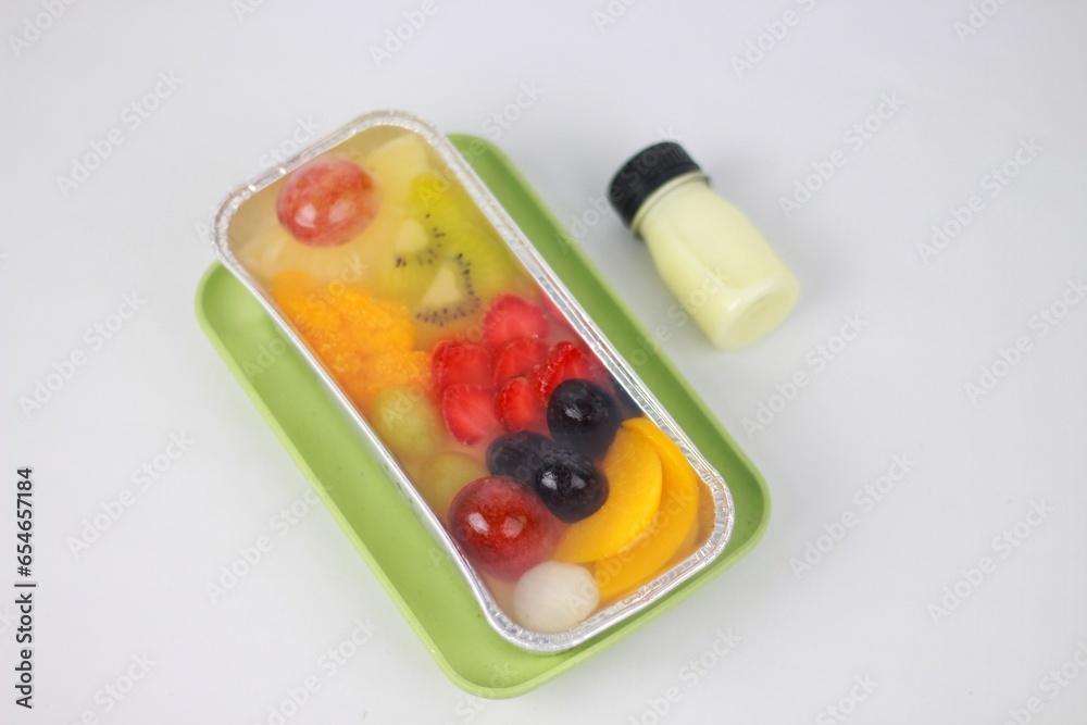 Fruity Milk Pudding, sweet vanilla silk pudding dessert with fruit topping Fruity Milk Pudding, sweet vanilla silk pudding dessert with fruit topping