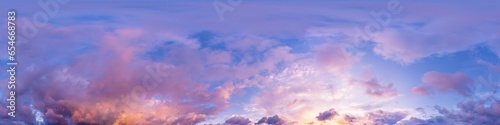 Sunset sky panorama with dramatic bright glowing pink Cumulus clouds. HDR 360 seamless spherical panorama. Full zenith or sky dome for 3D visualization, sky replacement for aerial drone panoramas. © svetograph