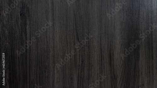 Realistic wood pattern on PVC object surface. Appearance of light brown and dark brown mixed together. for background and textured. photo