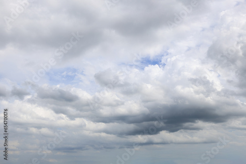 Background of storm clouds before rain. Fantastic dark thunderclouds, natural sky composition, wide panorama
