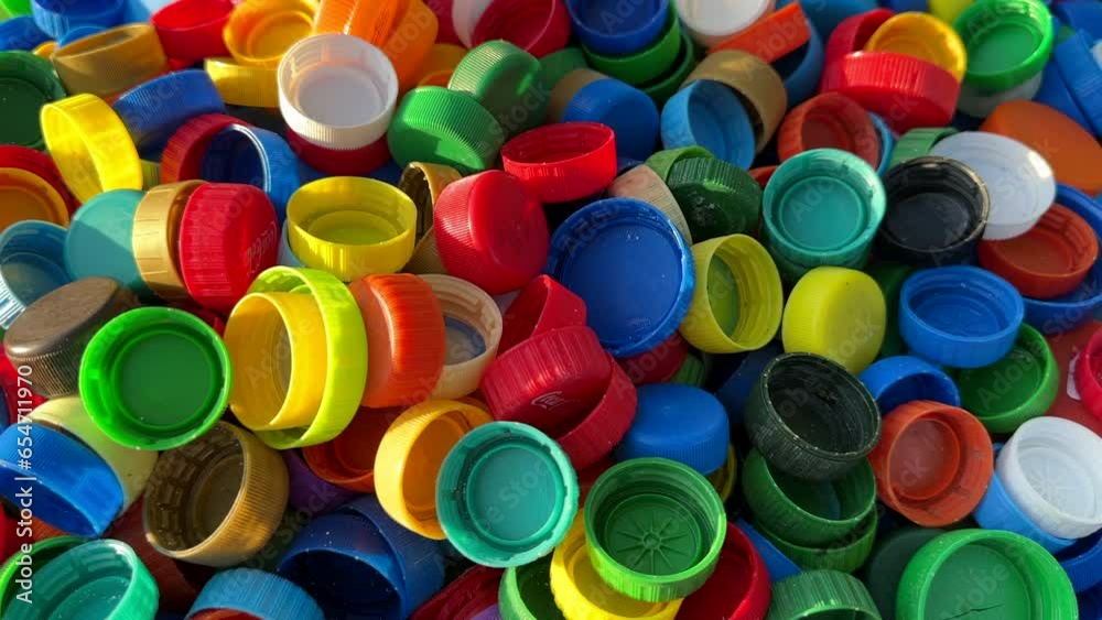 Recycling Plastic Bottle Caps. Plastic Material is Recyclable. Remove