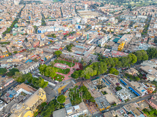 Aerial view of the Barranco neighborhood in Lima, Peru in 2023. Spanish colonial style historic buildings. Neighborhood with new houses and also many houses degraded by time. Gastronomic region  © Paulo