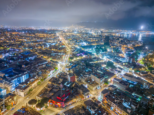 Night aerial image of the Barranco region, Lima. Peru. Homes, businesses and nightlife in 2023. photo