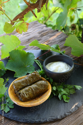 Delicious dolma, national dish of Azerbaijan, Turkey on a stone tray