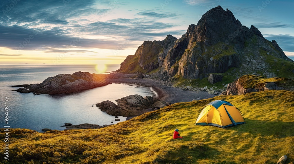 wild camping in the Lofoten islands. camping tent among mountains. sunset over a camping spot behind the Polar Circle. Panorama of the perfect landscape during the midnight sun - obrazy, fototapety, plakaty 