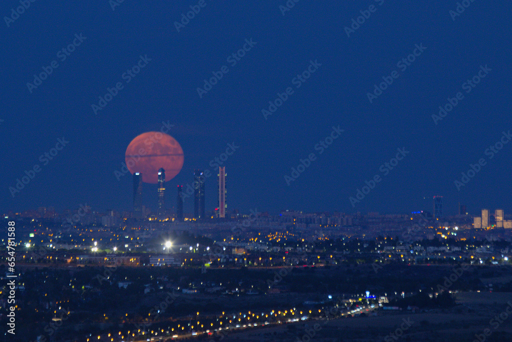 Obraz na płótnie Madrid business area 4 torres skyline night full moon . Spain w salonie
