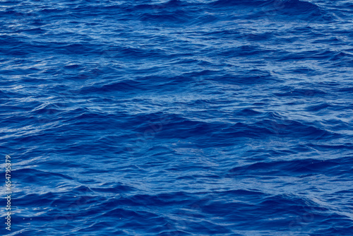 Blue sea waves close up.