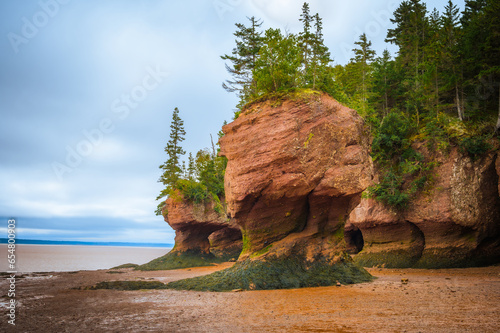 Hopewell Rocks Provincial Park at low tide on a cloudy day, Bay of Fundy, Hopewell Cape, New Brunswick, Canada. Photo taken in September 2023.