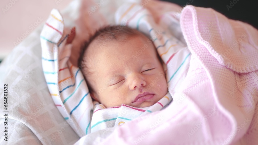 baby sleeping sun newborn close-up lifestyle. newborn a baby sleeping lying in bed looking at the camera close-up. motherhood family kid dream concept. newborn sleeping close eyes portrait baby sleeping sun newborn close-up lifestyle. newborn a baby sleeping lying in bed looking at the camera close-up. motherhood family kid dream concept. newborn sleeping close eyes portrait