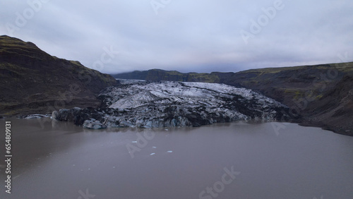 Aerial view of the Solheimajokull is an outlet glacier of the mighty icecap of Myrdalsjokull on the South Coast of Iceland. It is the fourth-largest ice cap in Iceland.