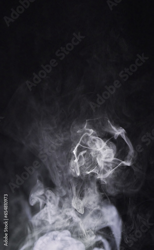 Smoke  dark background and mist  fog or gas on mockup space wallpaper. Cloud  smog and magic effect on black backdrop of steam with abstract texture  dry ice pattern or vapor of incense moving in air