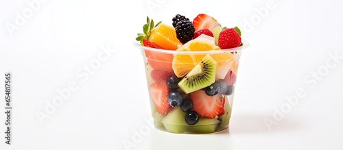Fruit salad cup on white background with copyspace for text