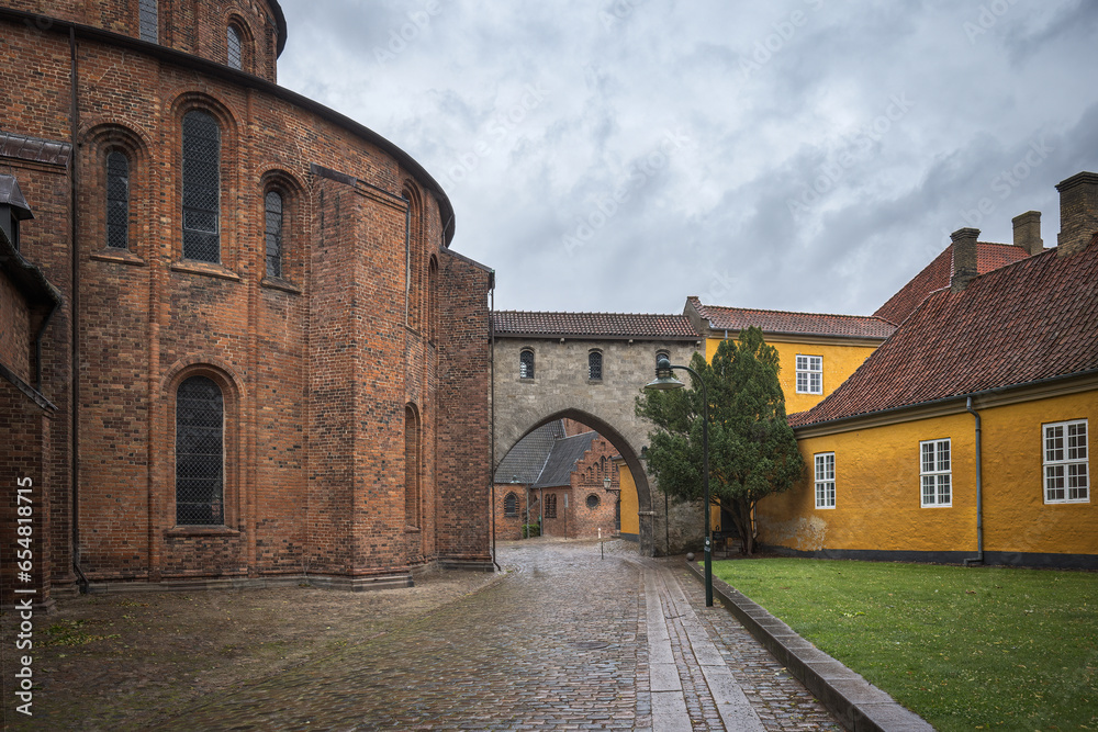 The Absalon Arch  between bishop's palace and Gothic Roskilde Cathedral. Roskilde. Denmark