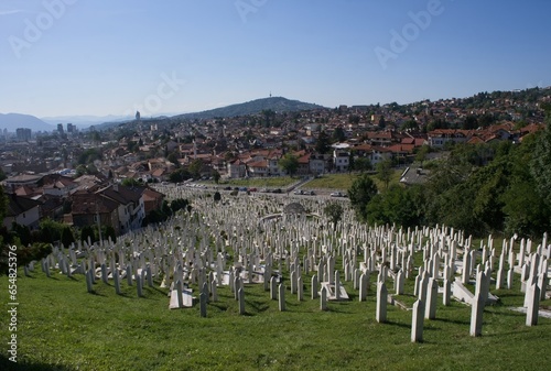 Sarajevo, Bosnia and Herzegovina - Sep 27, 2023: Martyrs' Cemetery where Alija Izetbegovic rest in peace. A walking in the center of Sarajevo city in Bosnia and Herzegovina federation. Selective focus photo