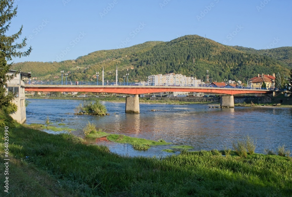 Gorazde, Bosnia and Herzegovina - Sep 29, 2023: This pedestrians bridge under another bridge was built in the Bosnia War to protect pedestrians against snipers when crossing the river. Selective focus Gorazde, Bosnia and Herzegovina - Sep 29, 2023: This pedestrians bridge under another bridge was built in the Bosnia War to protect pedestrians against snipers when crossing the river. Selective focus