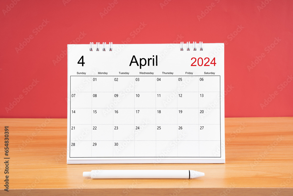 The April monthly desk calendar for 2024 year and pen on wooden table with red color background. - obrazy, fototapety, plakaty 