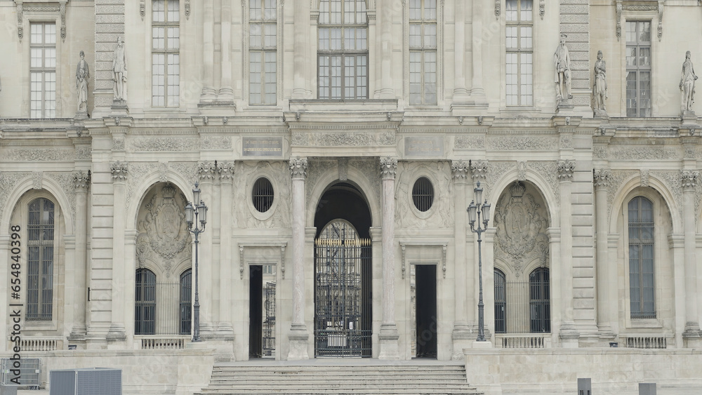 The facade of the cathedral. Action. City square with an architectural building.