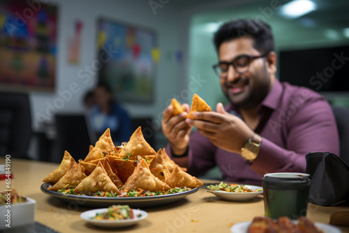 Picture of a woman eating a samos, diwali celebration photo