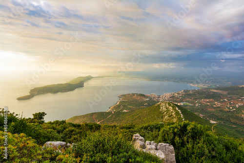 Top view of the iconic and picturesque town of Pylos and of the nearby island Sfaktirias, Messinia prefecture, Peloponnese, Greece photo