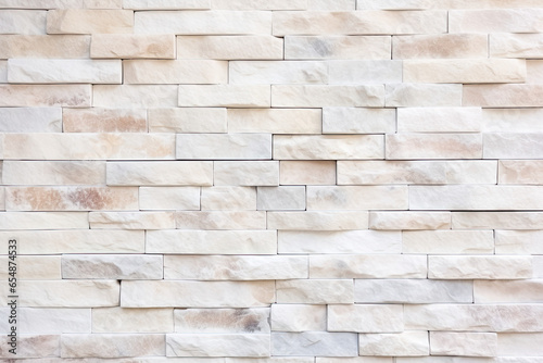 Cream and white brick wall texture background. Brickwork and stonework flooring interior rock old pattern design.