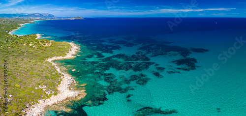 Aerial drone view of the Cea beach with the Red Rocks, Sardinia, Italy