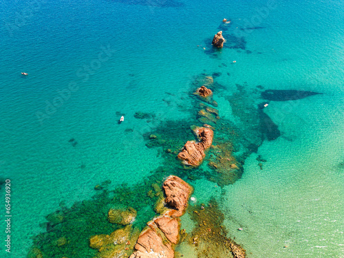 Aerial drone view of the Cea beach with the Red Rocks, Sardinia, Italy